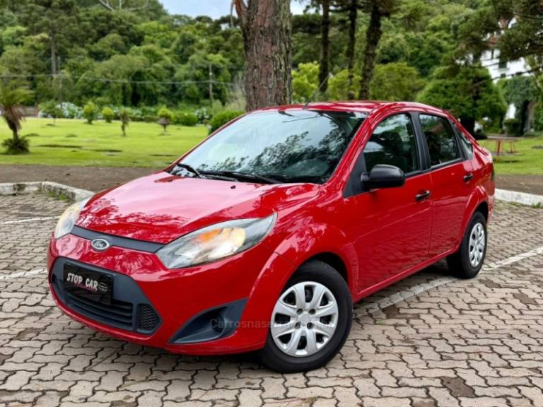 FORD - FIESTA - 2012/2013 - Vermelha - R$ 34.900,00