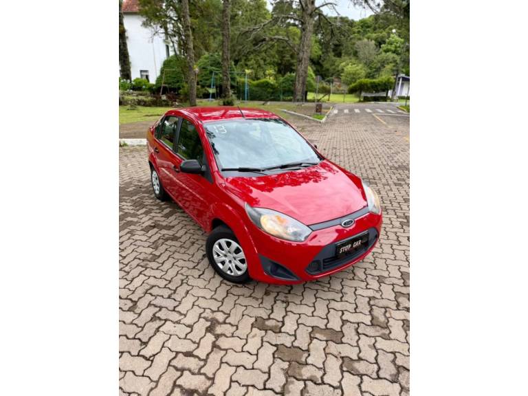 FORD - FIESTA - 2012/2013 - Vermelha - R$ 34.900,00